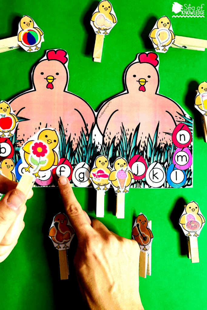 Fantastic Fine Motor Easter Centers for Preschoolers. This simple yet FUN activity will get the kids identifying letter sounds and matching the images to the letters on each egg (as they hatch). So much fun! This will have the kids working on their fine motor skills using the pegs. Be sure to laminate those chick cards so they hold up on repeated use. #preschoolteachers 