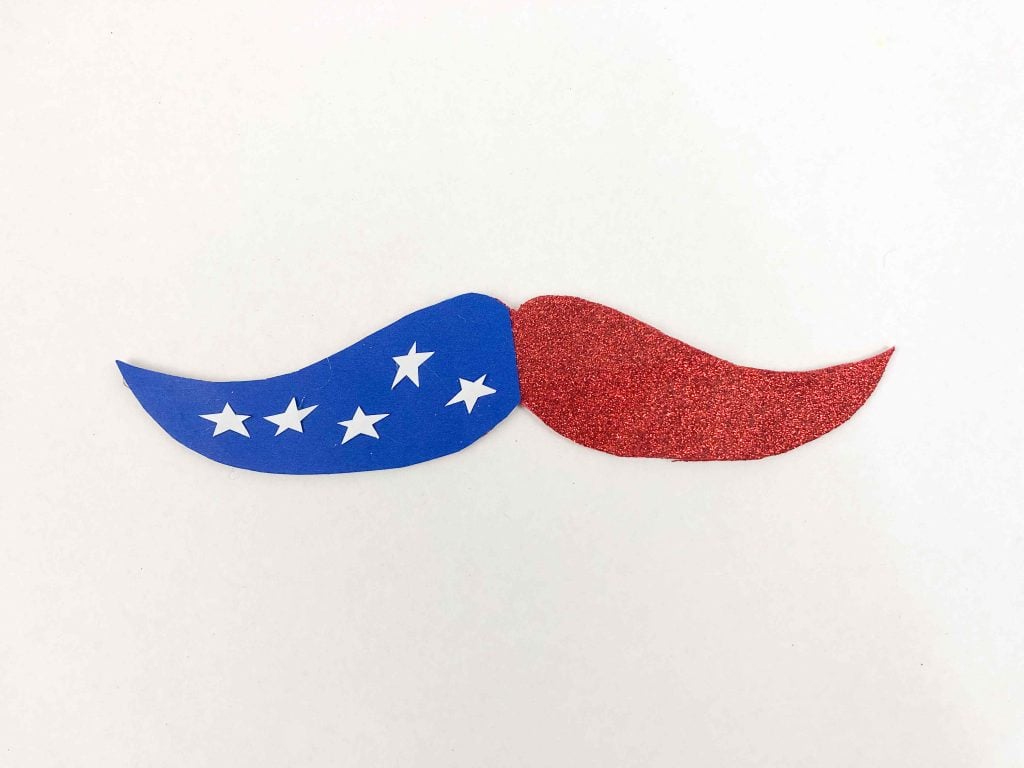 Are you looking for a fun and patriotic craft to celebrate American holidays like Memorial Day, Independence Day, and Labor Day? These super cute Red White and Blue Crafts are perfect! Look no further. In this blog post, we'll walk you through a step-by-step tutorial on creating a unique and exciting mustache topper craft that showcases the red, white, and blue spirit. 
