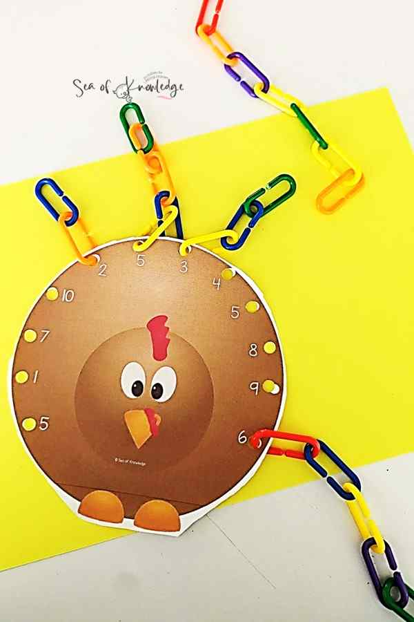 Boost Your Preschooler's Counting Skills with Our Fun Preschool Turkey Math Activity! 🦃 Looking for an engaging way to teach counting to preschoolers? Discover our FREE Turkey Activity printable, using colorful plastic links to make learning numbers a blast. Get your free download and explore more Thanksgiving activities for kids. Perfect for educators and parents! 🍂Download now and watch those counting skills soar.