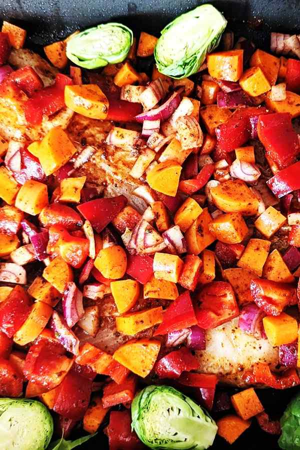 Cut, spice, and bake! Follow these easy steps to prep your veggies with paprika, cumin, and lemon for a simple yet delicious fish tray bake.