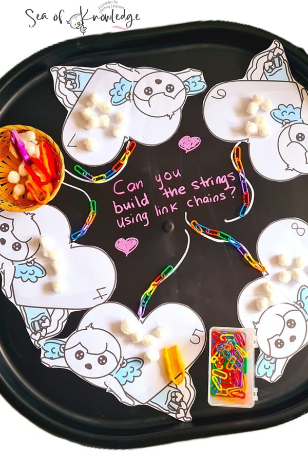 I’m sharing my favorite Valentine's Day Tuff Tray idea! Grab a free letter sounds chocolate heart printable for toddlers and preschoolers. Fun, learning, and hearts all in one!