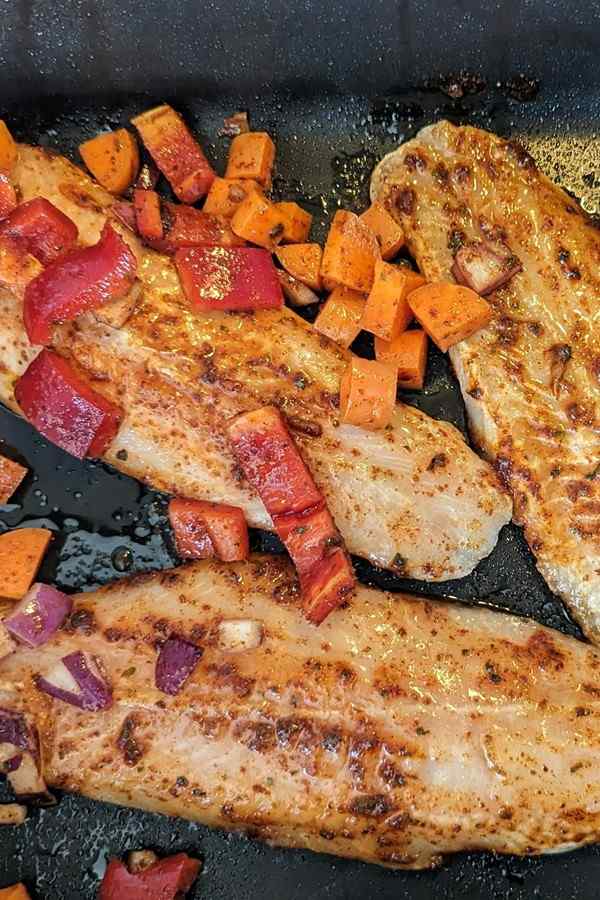 No stress, just flavor! See how I prep my veggies with the perfect mix of spices for a one-tray fish bake that’ll wow your taste buds.