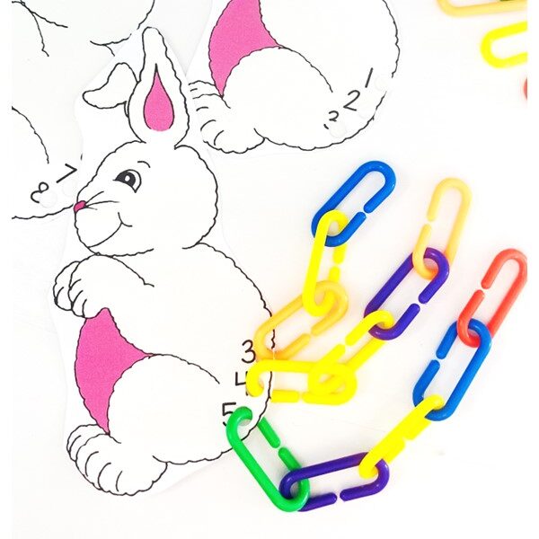 Preschool math activity printable with colorful illustrations, focusing on counting and number recognition.