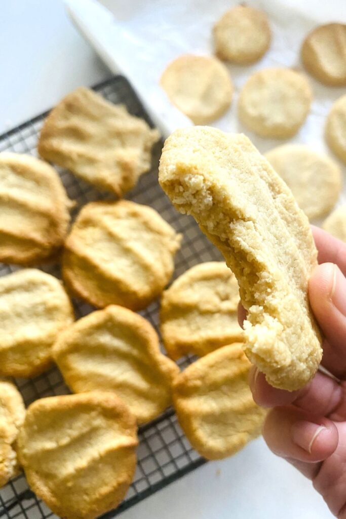 A plate of homemade almond shortbread cookies, perfect for pairing with tea or coffee.