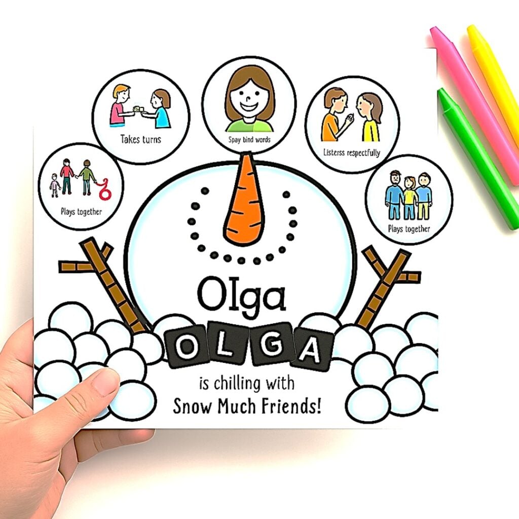 Completed snowman friendship craft from Magic of Friendship Snow with name pieces and writing prompt