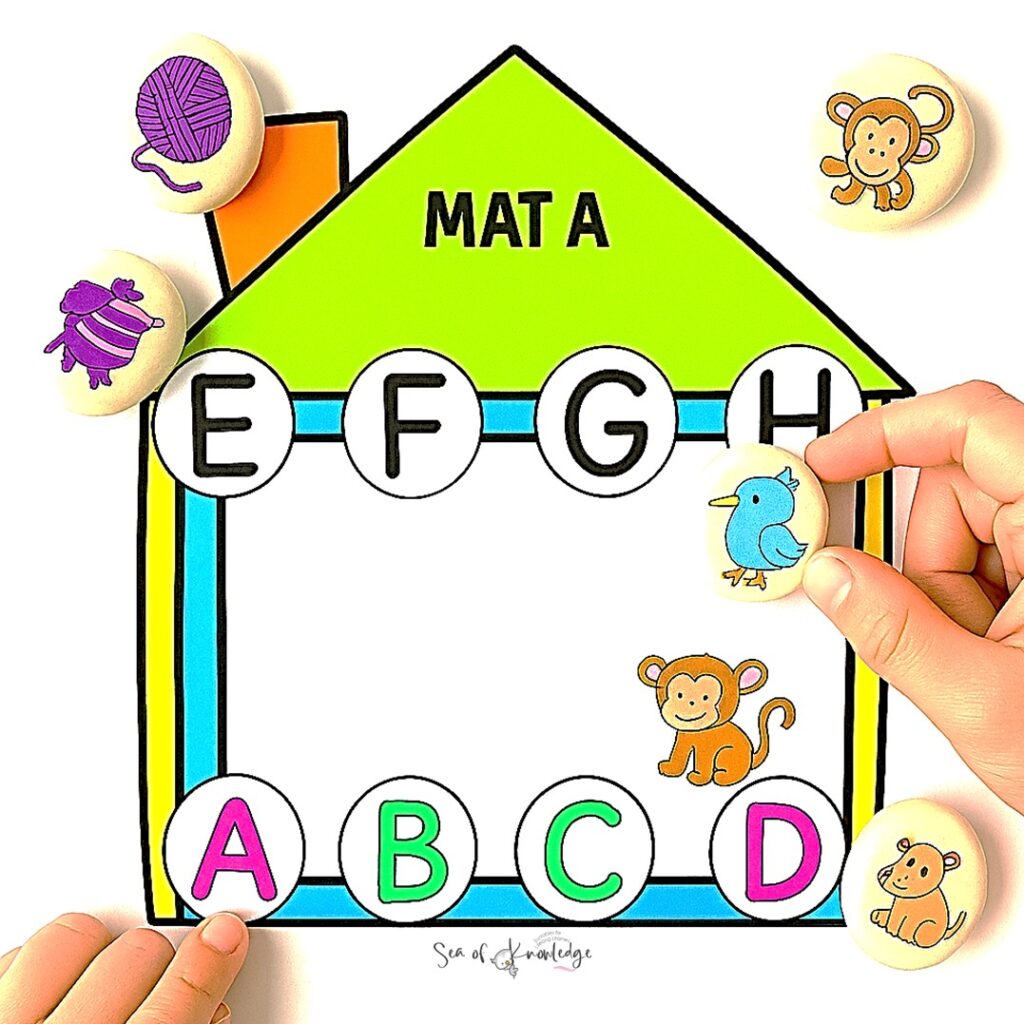 Story stones activity setup with mats and basket of alphabet stones for preschool learning centers.