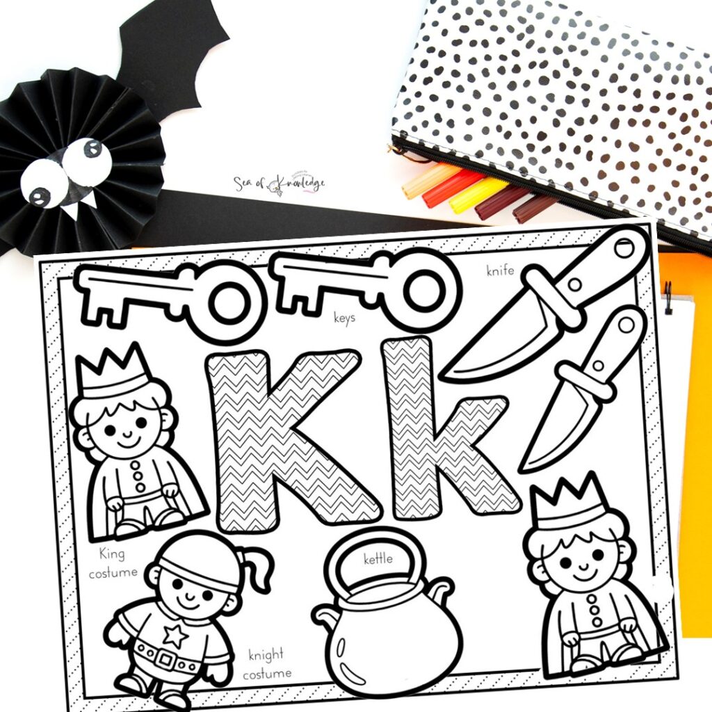 Blackline Halloween coloring page with fine motor and phonics focus for young learners.