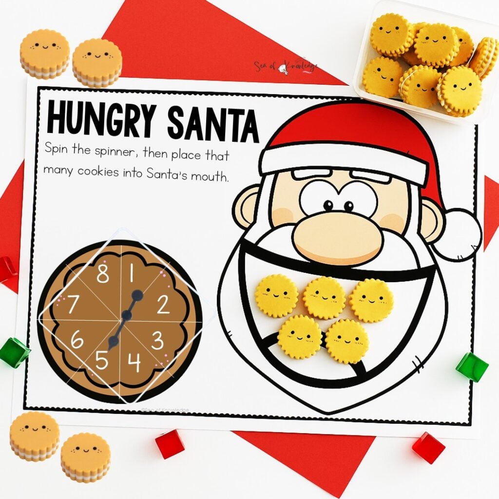 This Santa Count and Spin Busy Book Binder Mat is a hands-on math game that kids will absolutely love! To play, students spin the spinner to get a number, then count out that many “cookies” to feed Santa. 