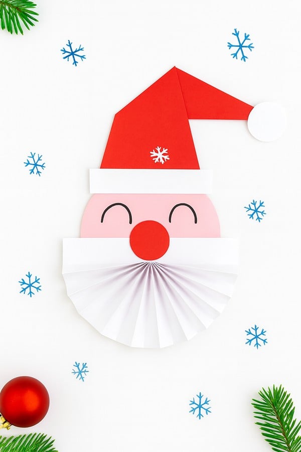 Simple cut and paste Santa craft with cotton beard and googly eyes