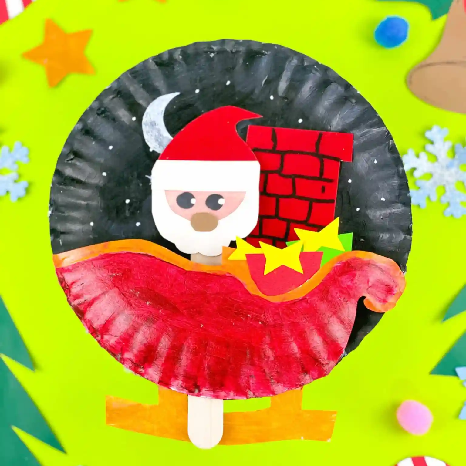 Paper plate sleigh craft featuring Santa and cotton snow for storytelling activity