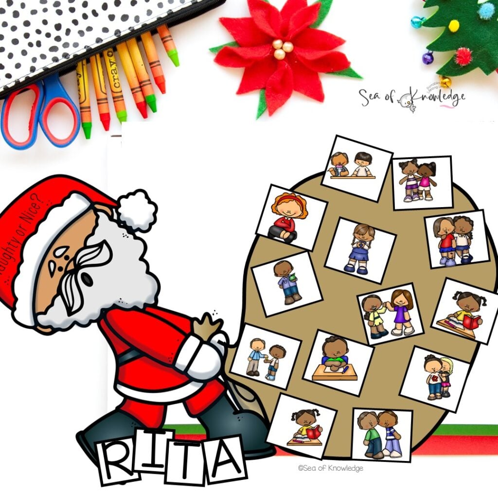 Students sorting behavior cards into Santa’s nice and naughty bags during SEL craft