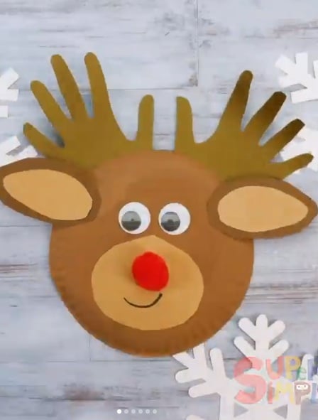 Paper plate reindeer craft with handprint antlers