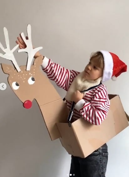 Life-size reindeer Christmas decoration made from cardboard boxes