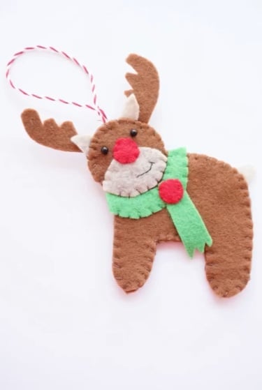 Brown felt reindeer ornament with a red nose, green scarf, and hanging loop